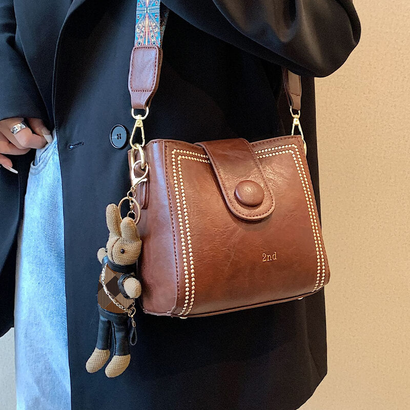 đ
JoulualennusmyyntiđVintage muoti laukku sÀÀdettĂ€vĂ€llĂ€ leveĂ€llĂ€ olkahihnalla