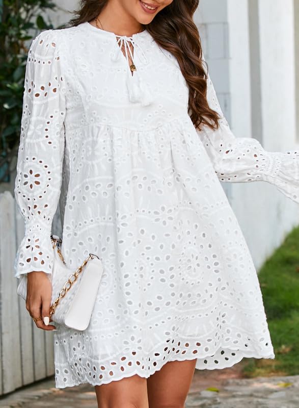 Broderie Anglaise -mekko juhliin A-linjaisella leikkauksella, V-kaula-aukolla ja röyhelöillä