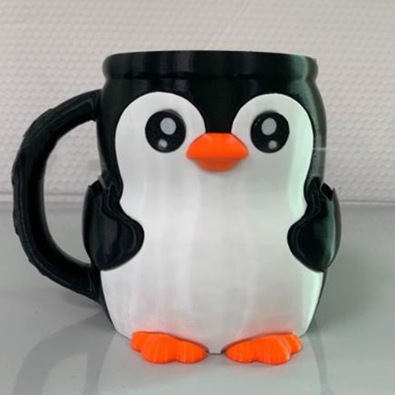 Söpö pingviini jäätelöpikarin pidike