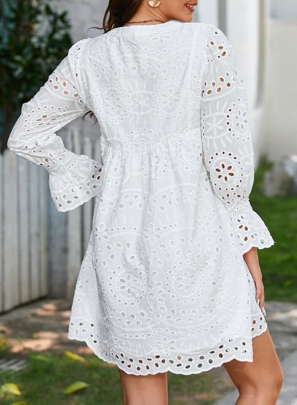 Broderie Anglaise -mekko juhliin A-linjaisella leikkauksella, V-kaula-aukolla ja röyhelöillä