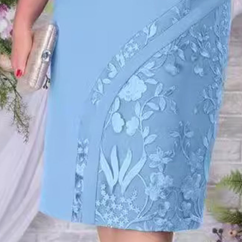 Mekko, jossa kukkakuvioitua tylliä